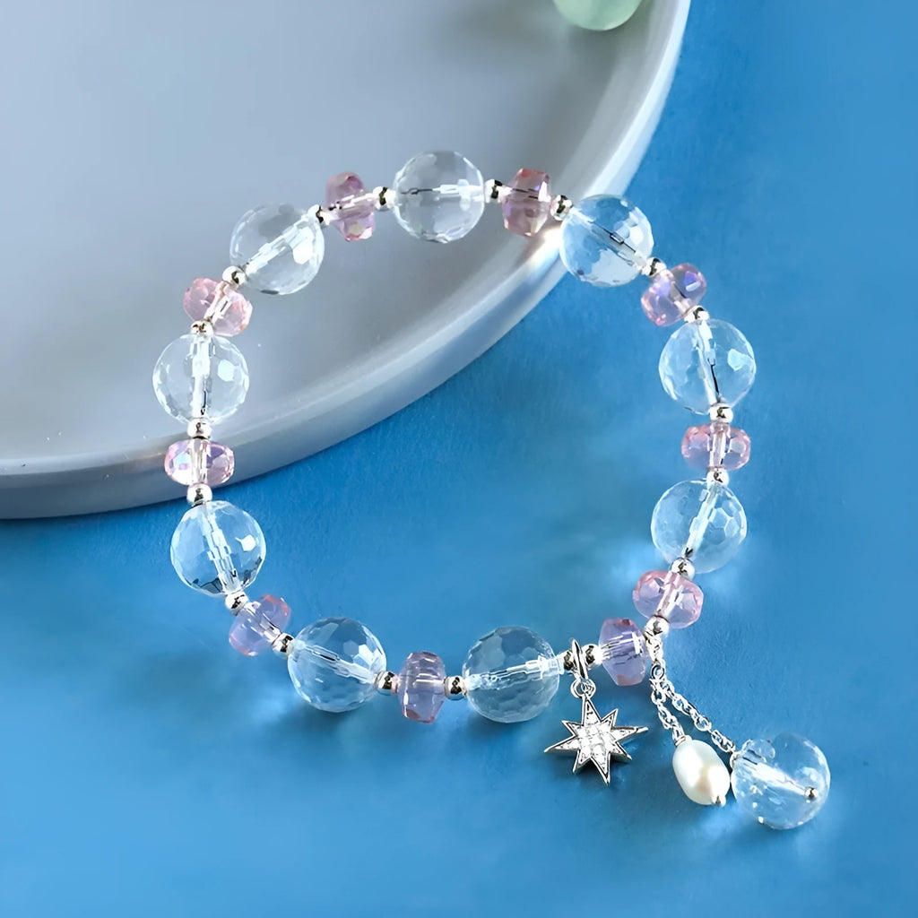 White crystal bracelet with lucky cat charm and diamond-shaped XINGX crystal centrepiece