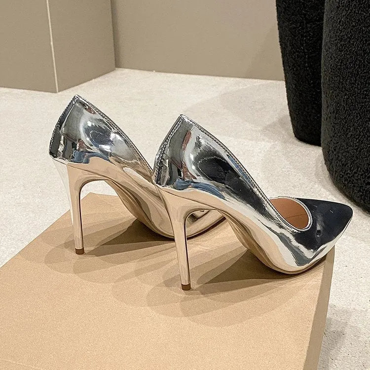 Gold pointed toe stiletto heel pump with low-cut PU leather upper