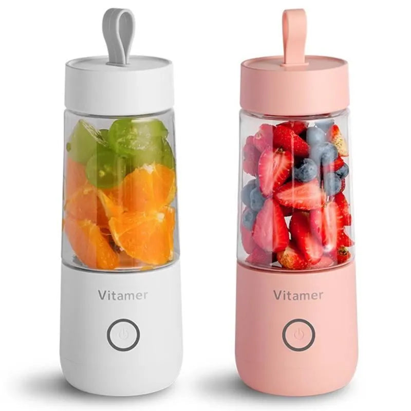 White portable USB rechargeable blender bottle with silicone lift ring, shown next to its charging cable.