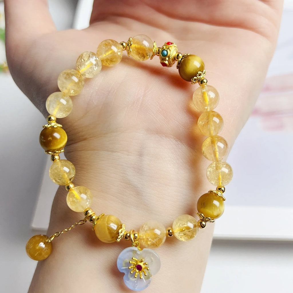 Women's citrine bracelet with floral tassel design, handcrafted crystal jewellery