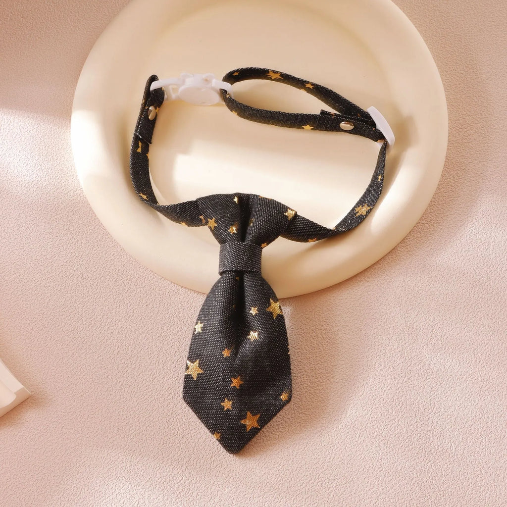 Designer dog collar with golden star decoration on adjustable strap, black colour, S size