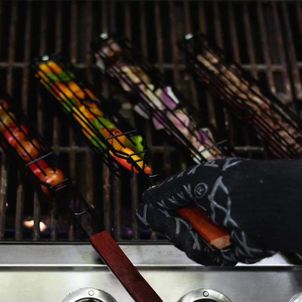 Barbecue basket with long wooden handle and iron mesh, showing rotary lid buckle.