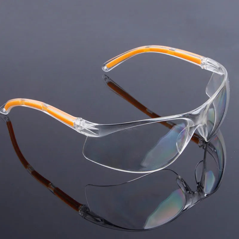 Transparent yellow-tinted labour protection safety goggles for workplace use