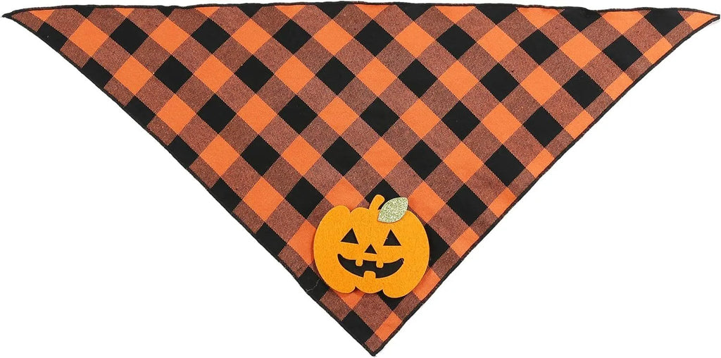 Orange Halloween dog bandana with pumpkin appliques and skeleton print on plaid fabric