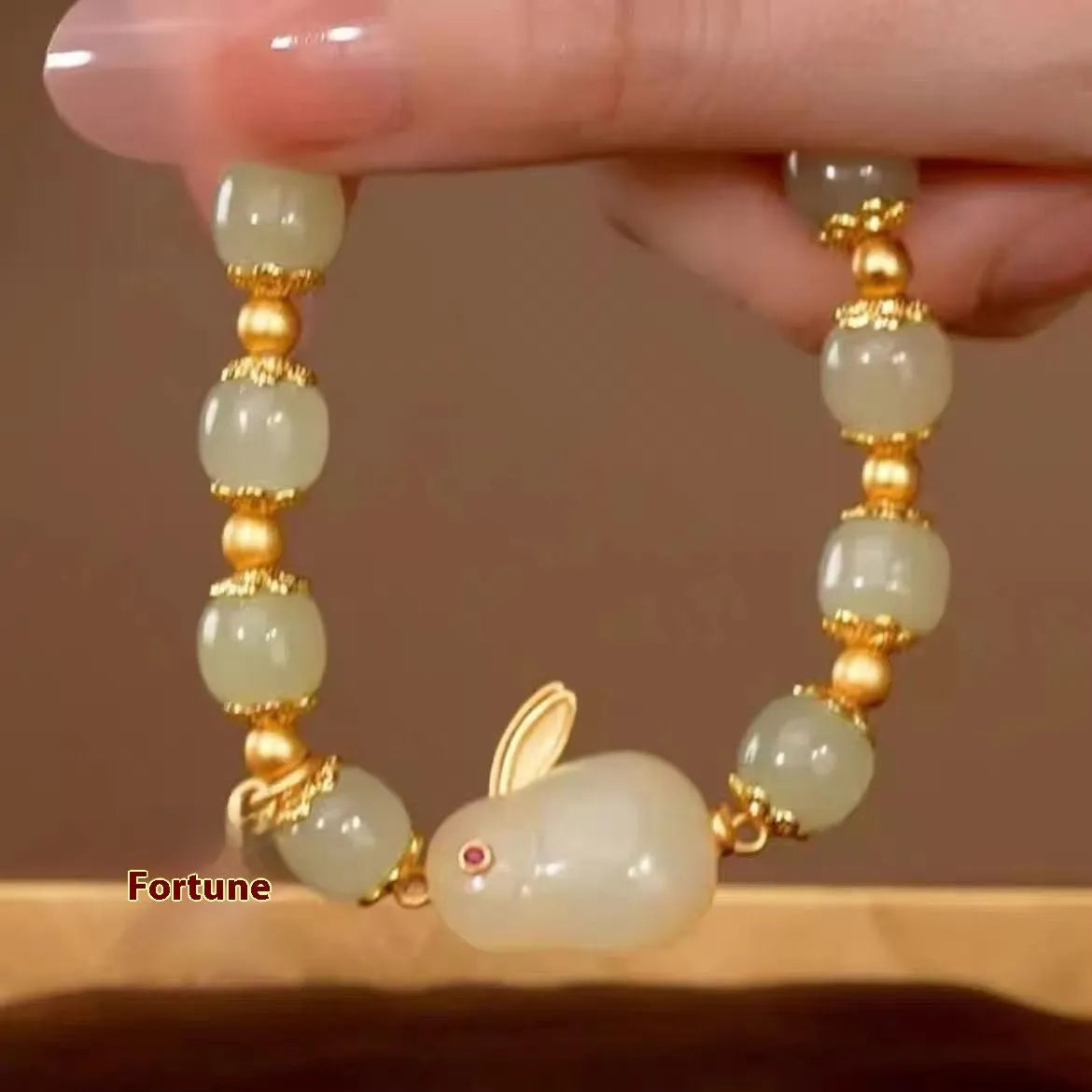 Green jade hare bracelet for women with Chinese zodiac animal styling and electroplated finish