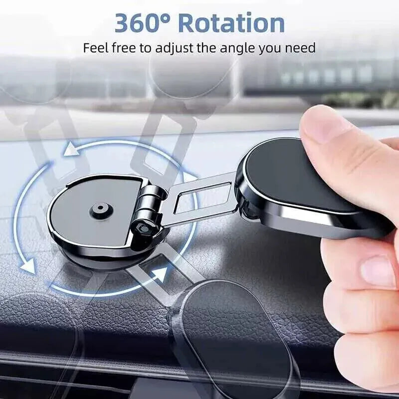 Chrome magnetic car phone holder with foldable bracket and 360-degree swivel on a car dashboard