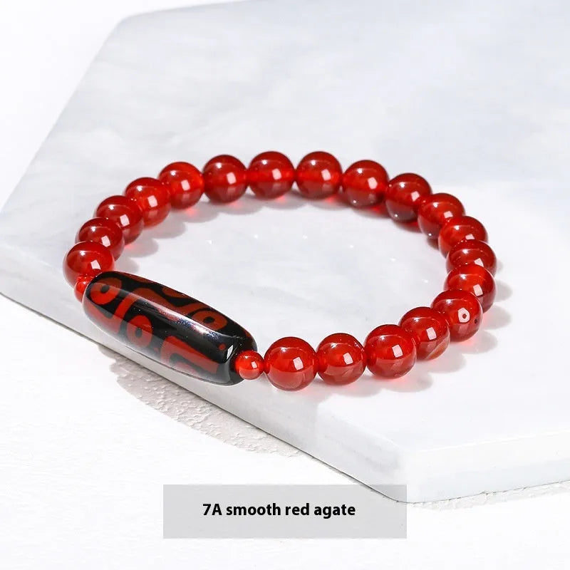 Handmade barrel shaped Dzi bead bracelet in green with geometry design