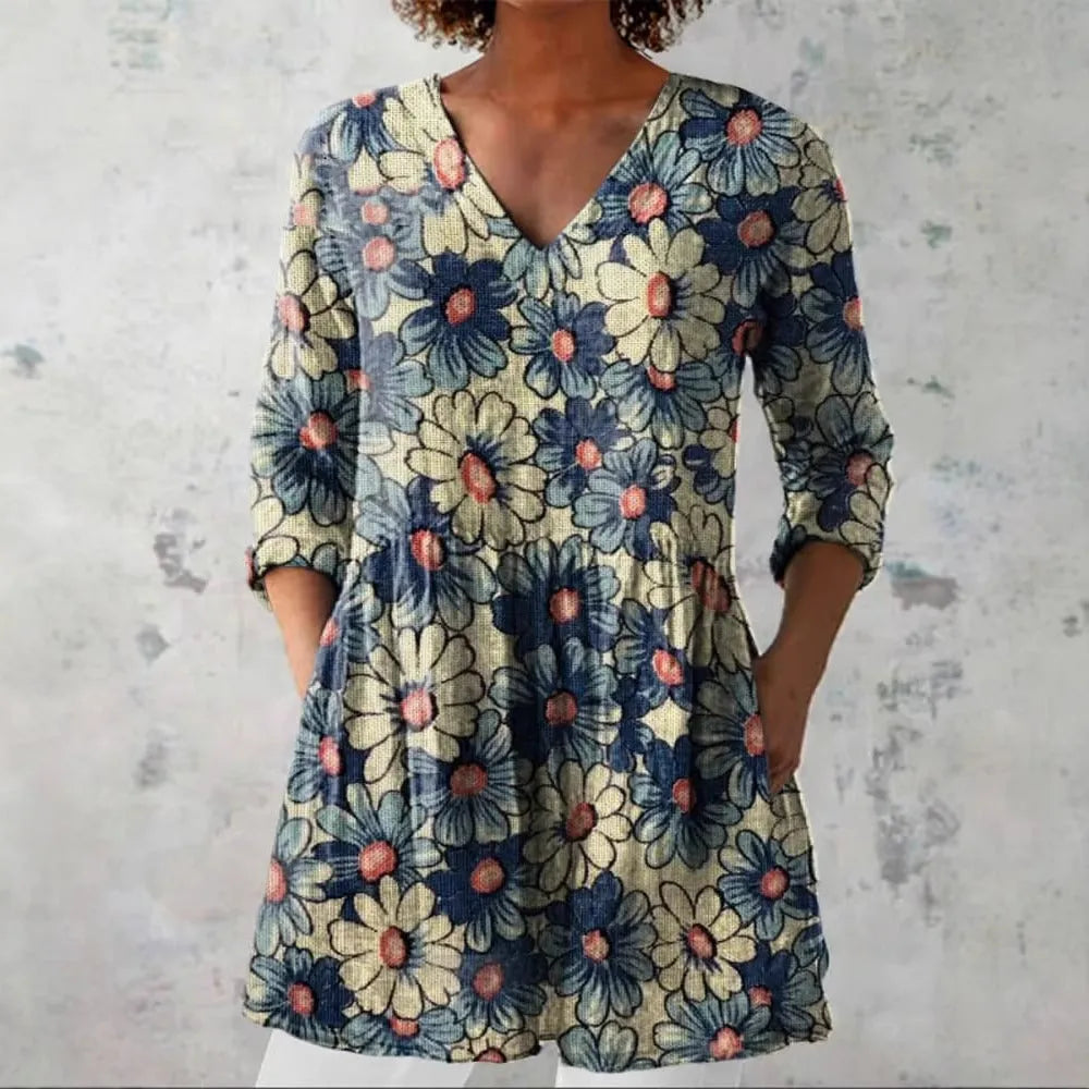 Women wearing a retro-style slim fit long-sleeved top with a digital print pattern.