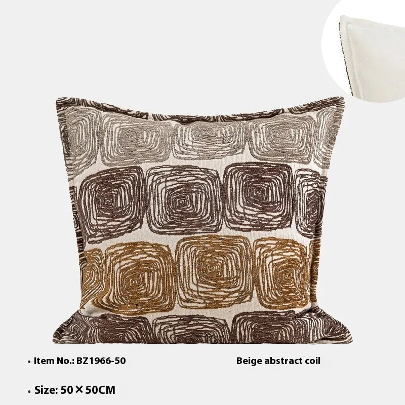 Cream and coffee coloured abstract coil pattern pillow cover in square and lumbar sizes.