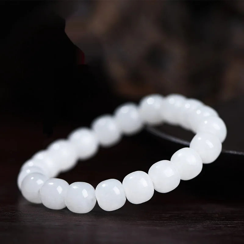 White Hetian jade barrel bead bracelet for men and women showing bead size options.