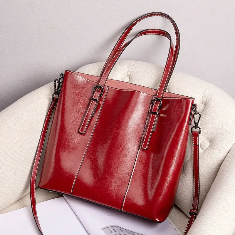 Brown genuine leather women's retro shoulder bag with three straps and multiple pockets