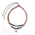 Men's wooden bead necklace with turquoise wax rope and geometric alloy pendant featuring flower details