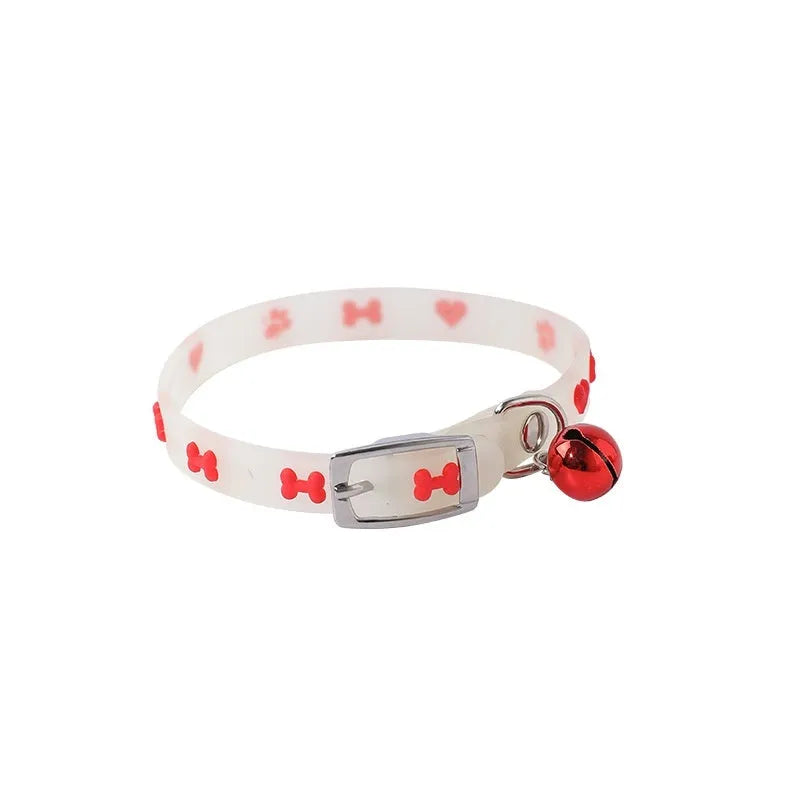 Luminous cat collar with adjustable silicone strap and metal bell in one of four patterns