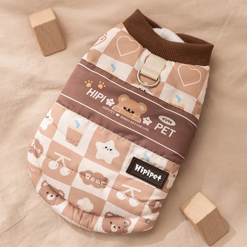 Quilted two-legged pet vest with leash ring in brown bear print or geometric red-green, sizes XS-XXL.