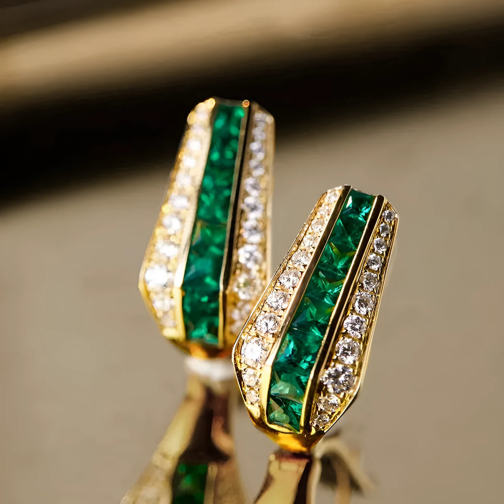 Yellow gold clip-on earrings with round and triangle faux emerald and zircon stones on copper