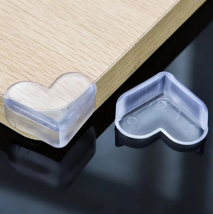 Heart-shaped PVC anti-collision baby safety corner protector on furniture edge, 5cm x 4cm x 2cm
