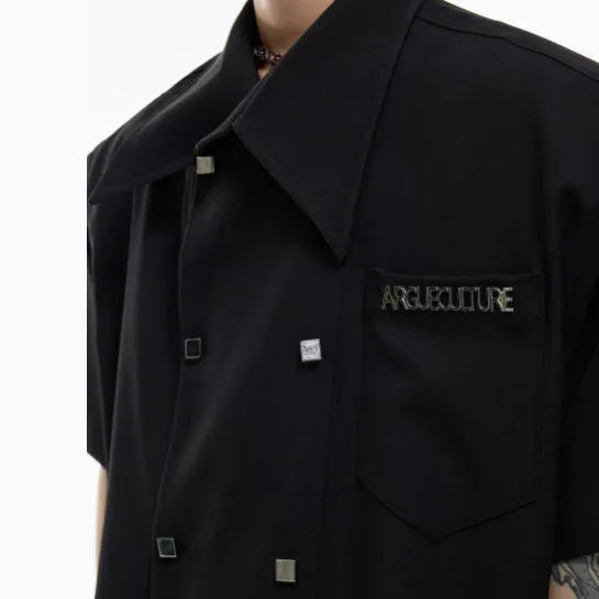 Men's loose fit short-sleeved casual shirt in black with lapel collar and decorative splicing.