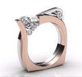 Rose gold women's ring with geometric band and inlaid zircon stones on a white background.