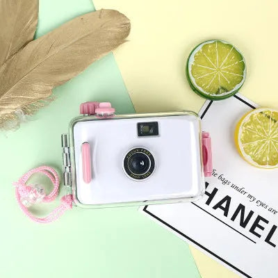 Lomo underwater waterproof mechanical film camera in assorted colours on a white background.