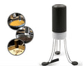 White and black automatic stirrer blender on a kitchen counter