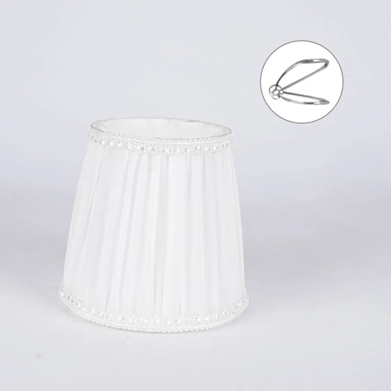 Fabric lampshade for crystal wall lamp in dark blue, white or black with bubble or pion pattern.