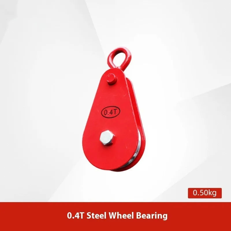 Red industrial steel lifting pulley with a safety latch on the hook for secure lifting.