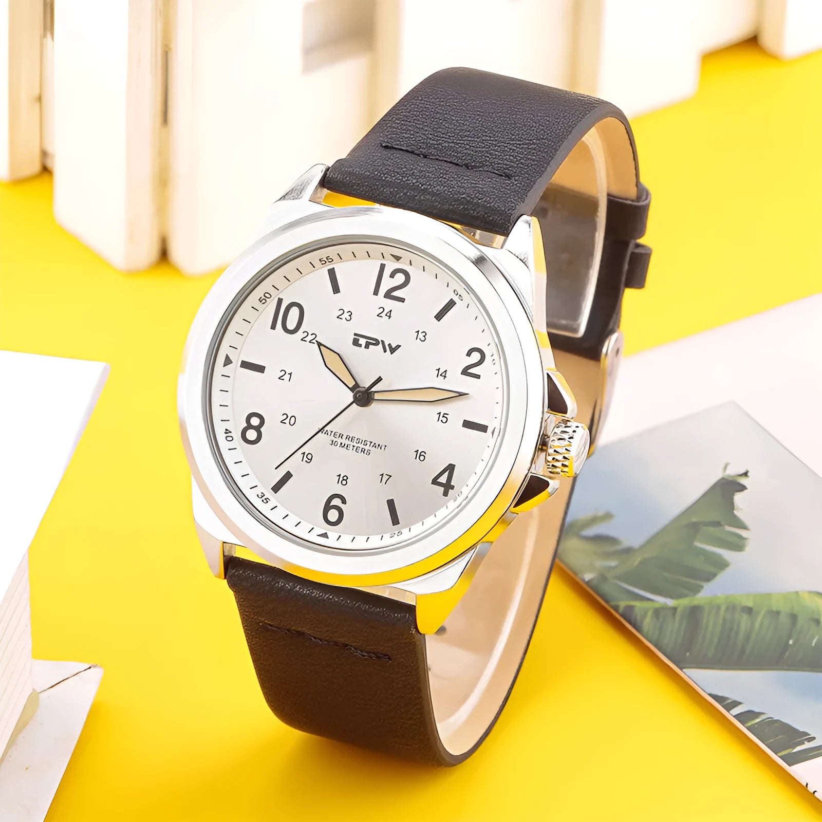 Simple Retro quartz watch with silver case, black leather strap, 42mm dial, and mineral glass face