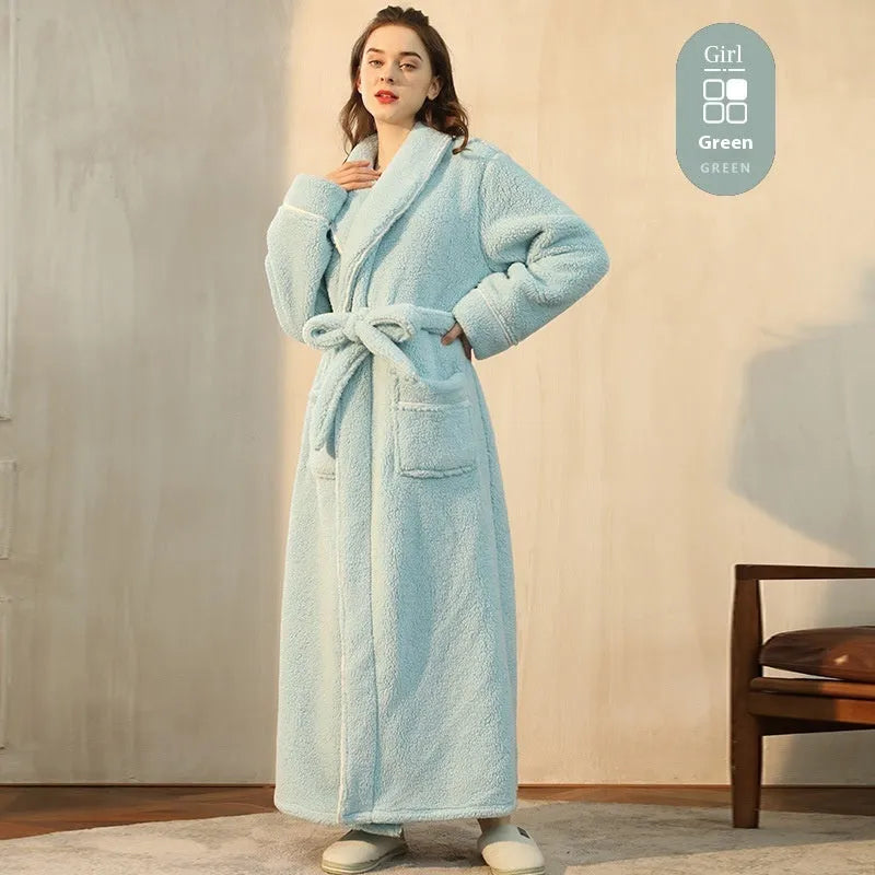 A man and woman wearing matching heavyweight navy blue flannel bathrobes, a couple's winter nightgown set.
