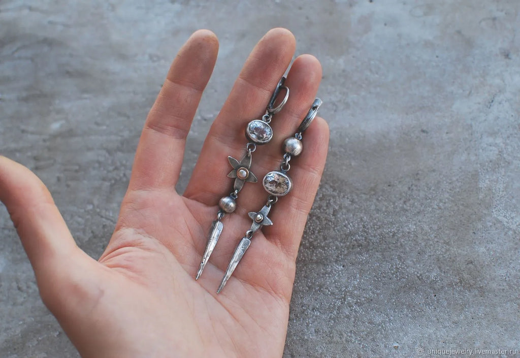 Geometric antique silver XINGX pendant earrings with long rhinestone detailing