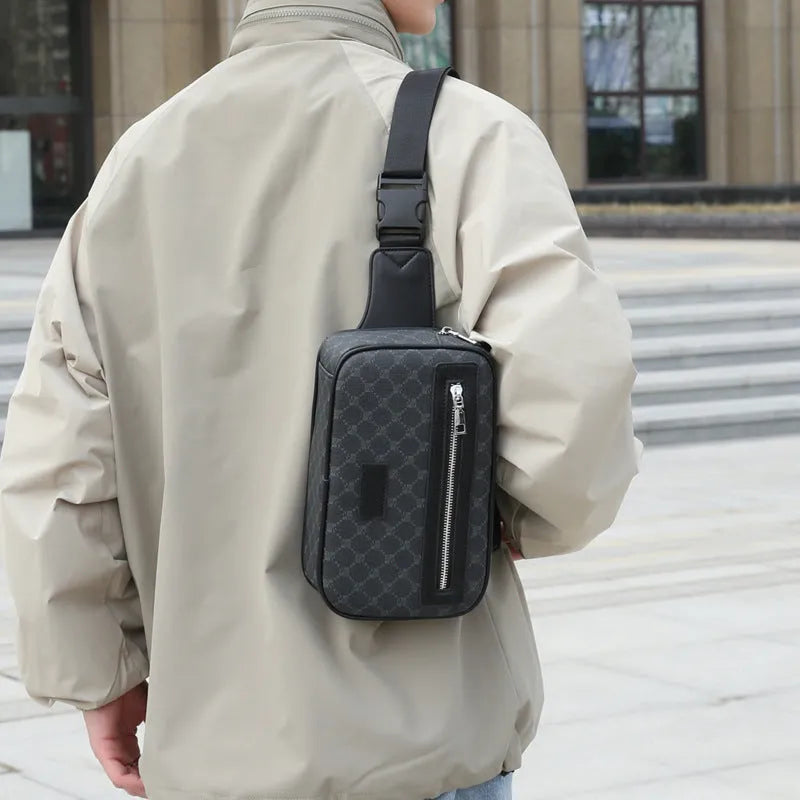 Men's black PU crossbody shoulder bag with chest-printed design and visible sewing lines