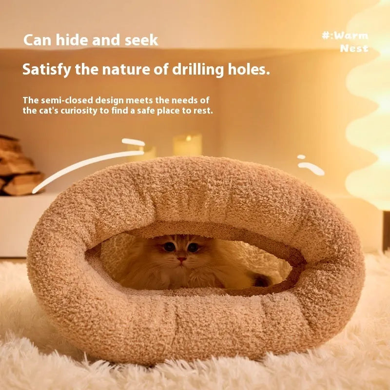 Brown semi-enclosed lambswool pet sleeping bag for cats on a wooden floor.
