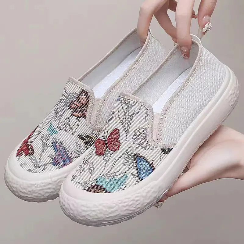 Old Beijing women's canvas slip-on shoes with soft plastic soles in black and white colour options