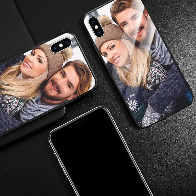Slim patterned protective case for Apple iPhone with raised edges around screen and camera.