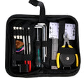 Black zippered case open to reveal 21 metal and plastic guitar repair tools including cutters, wrenches, and a winder.