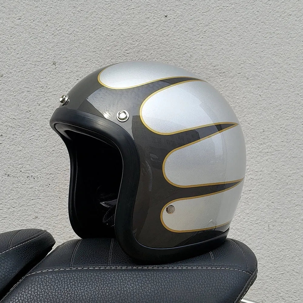 Retro-style open-face motorcycle half helmet in cement grey with a glossy FRP shell and quick-release chin strap.