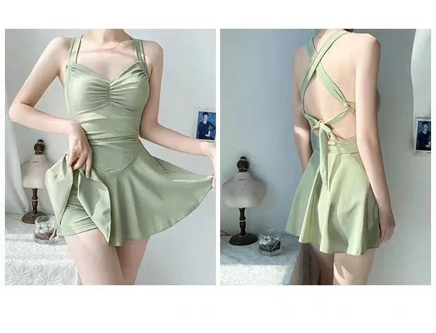 Women's solid colour one-piece swimsuit in avocado green with a backless and conservative style design.