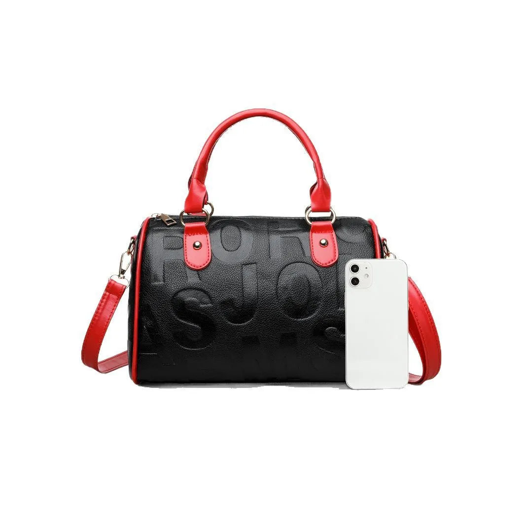 Brown cylindrical crossbody bag with three shoulder straps showing authentic leather texture