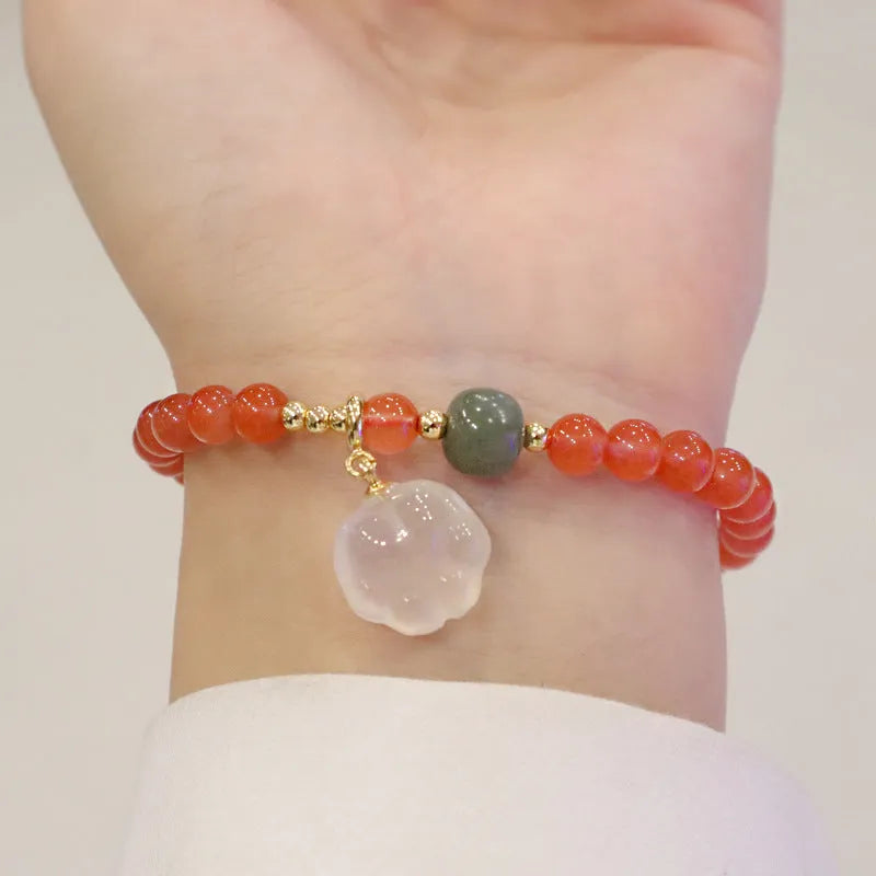 Red agate women's bracelet with cat's paw charm and jade inlay on 6mm band