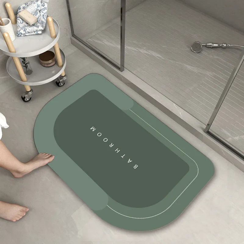 Blended fabric bathroom floor mat in blue, available in oval and rectangle shapes.