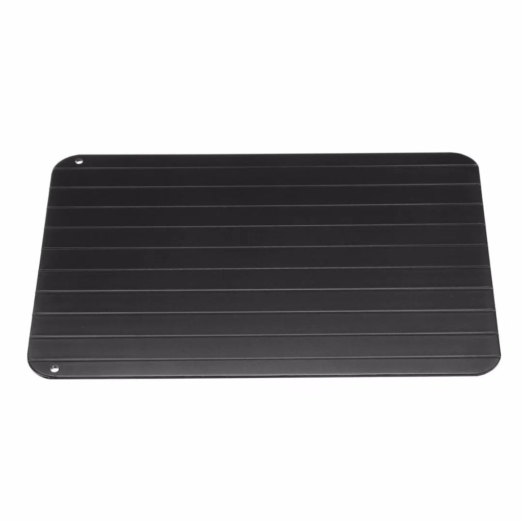 Black aluminium kitchen defrosting tray for thawing frozen meat and food without electricity