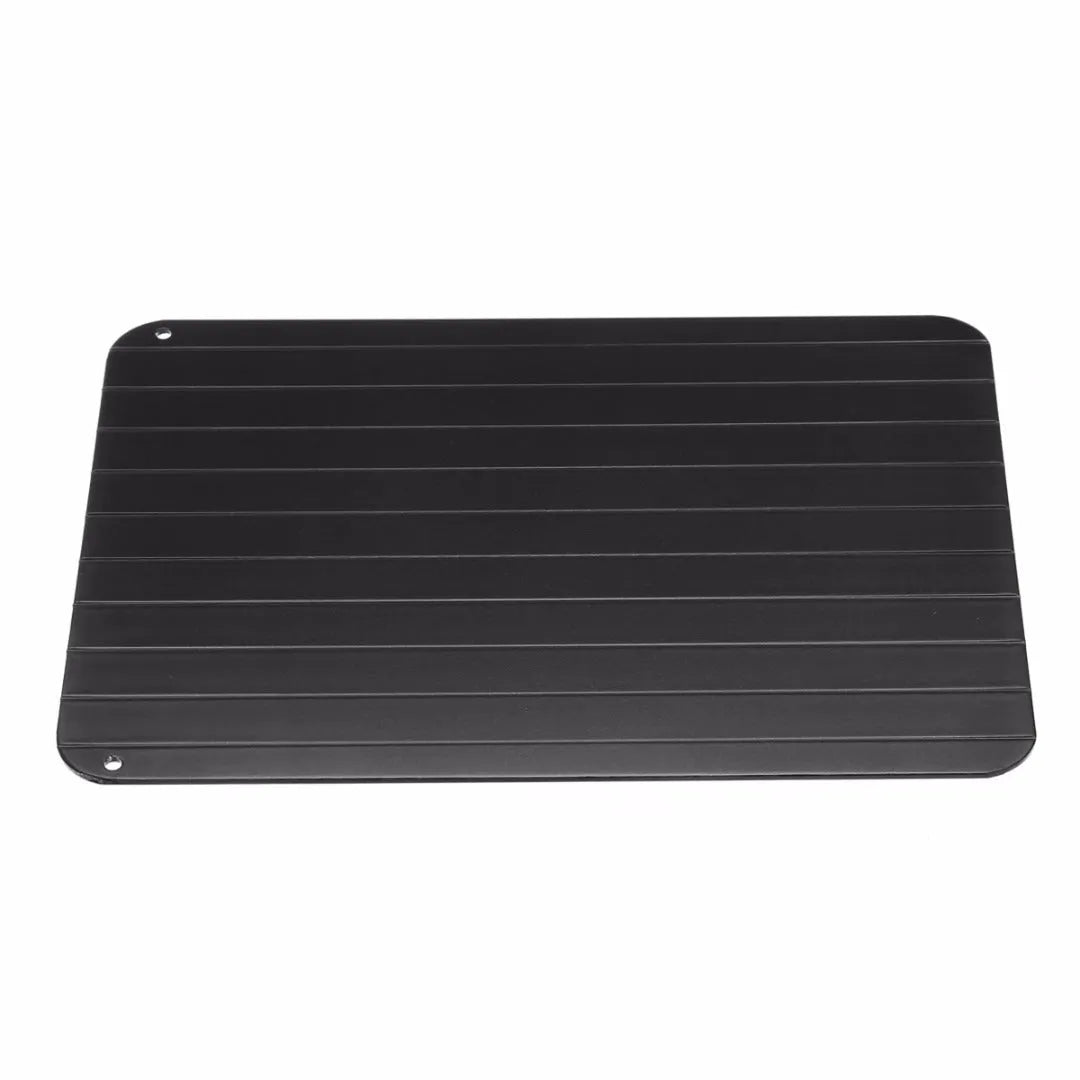 Black aluminium kitchen defrosting tray for thawing frozen meat and food without electricity