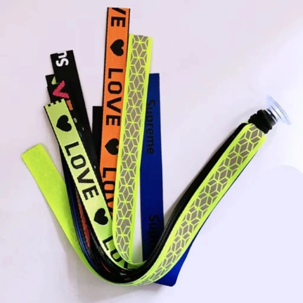 A decorative ribbon streamer for attaching to a child's roller skate or ski helmet, shown in a selection of colours.