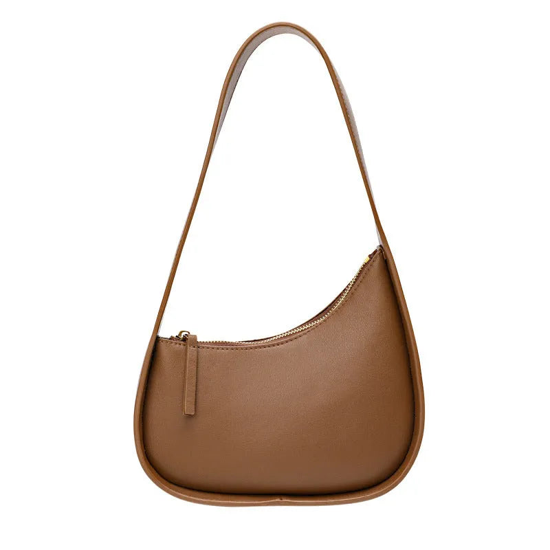 Small leather half moon shoulder bag with wide strap in four colour options