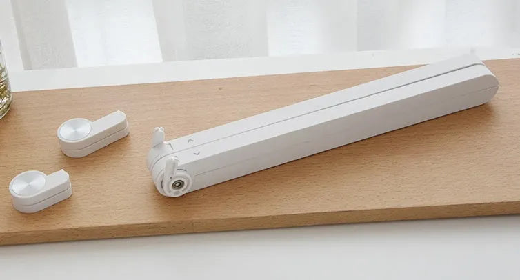 White aluminium laptop stand for Apple MacBook with folding design