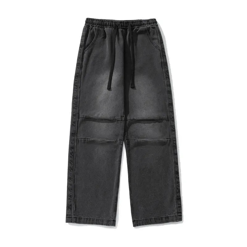 Men's pleated Japanese drawstring trousers in black, loose fit, mid-rise waist, cotton blend fabric, front view