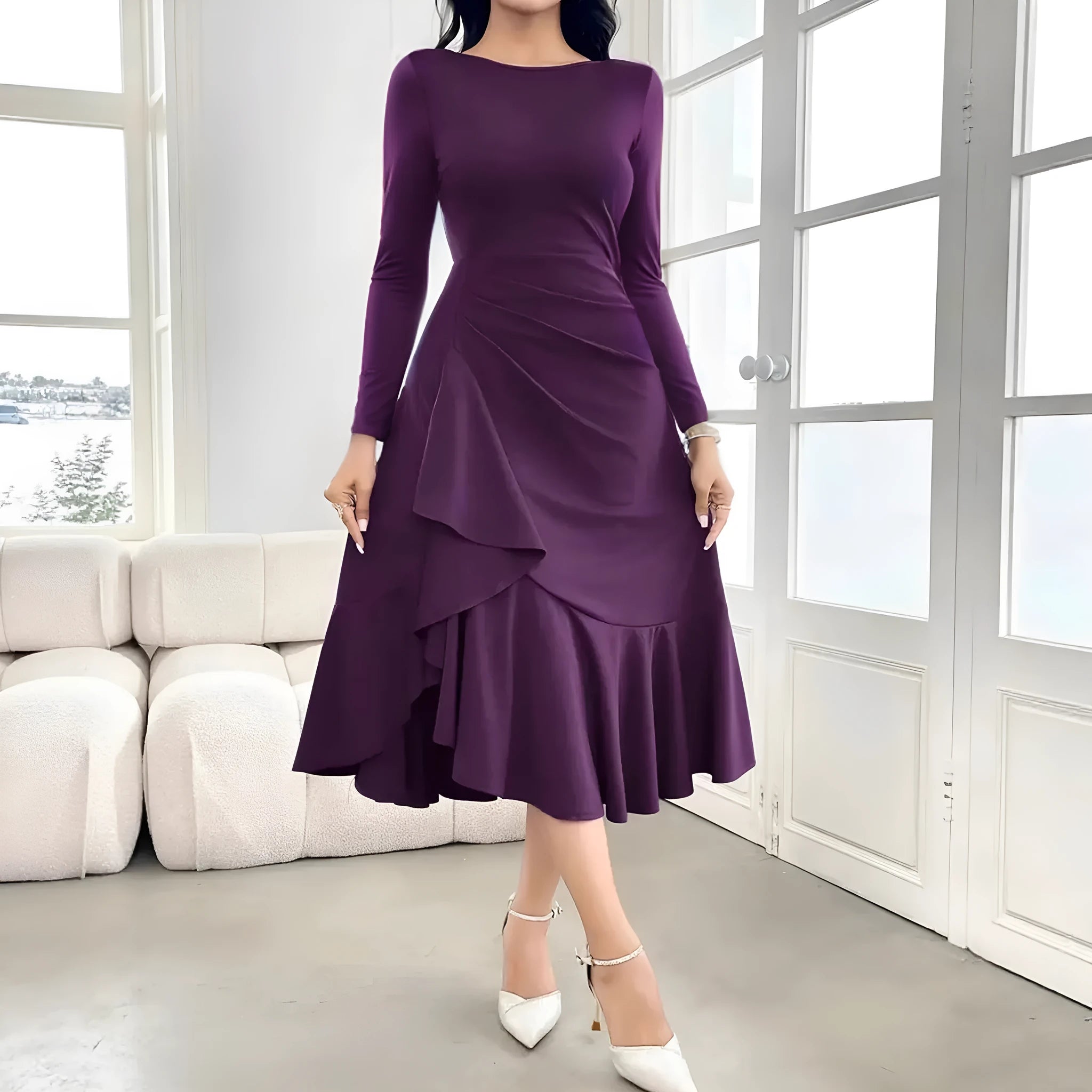 Purple women's long sleeve dress with ruffle detail and a round neck.