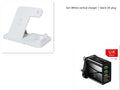 Black 4-in-1 wireless charging dock showing phone on angled stand, Apple Watch, AirPods case, and Apple Pencil charging simultaneously.
