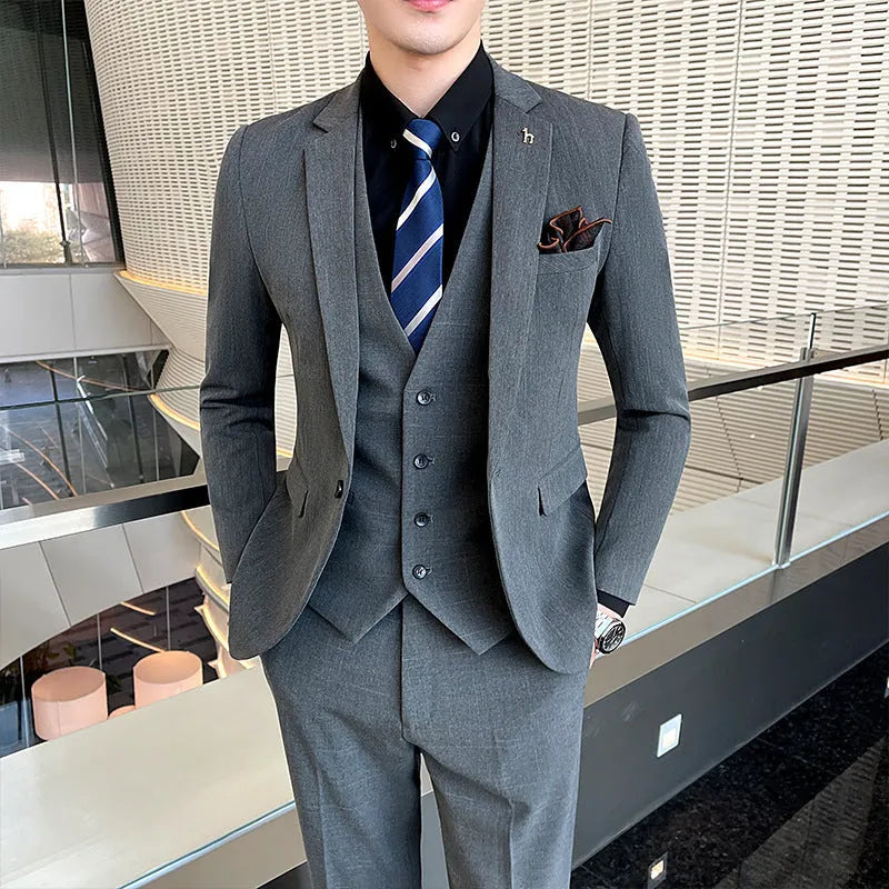 Slim fit British style suit for men in black or dark grey business formal wear