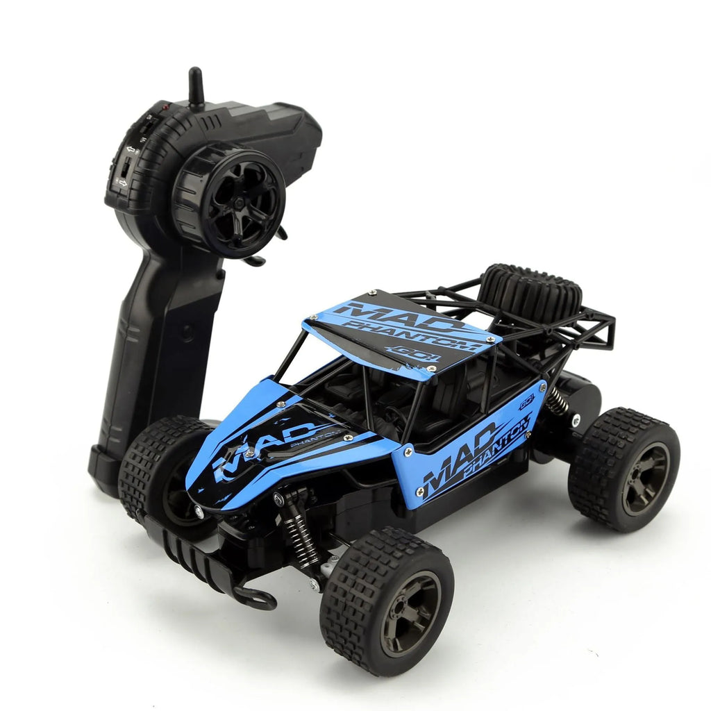 Blue 1:18 scale remote control off-road drift car with 2.4Ghz transmitter on a flat surface.