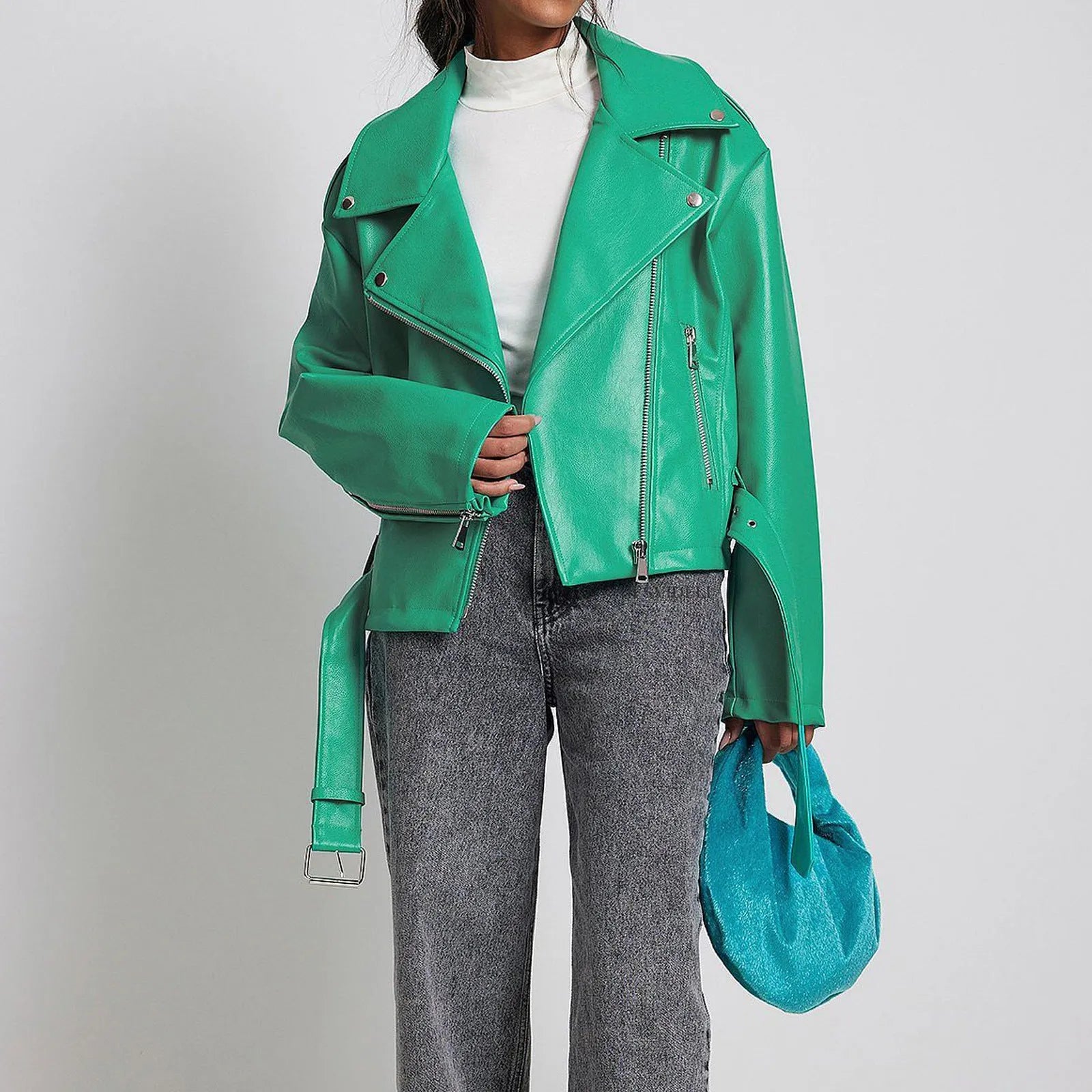 Black punk-style jacket with a drawstring waist and a soft Peter Pan collar on a hanger.